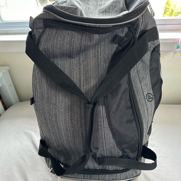 Protege Rolling Duffel Bag - Picture 3 of 6